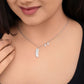 "Elegance in Silver: Diamond-Studded Oval Link Necklace."
